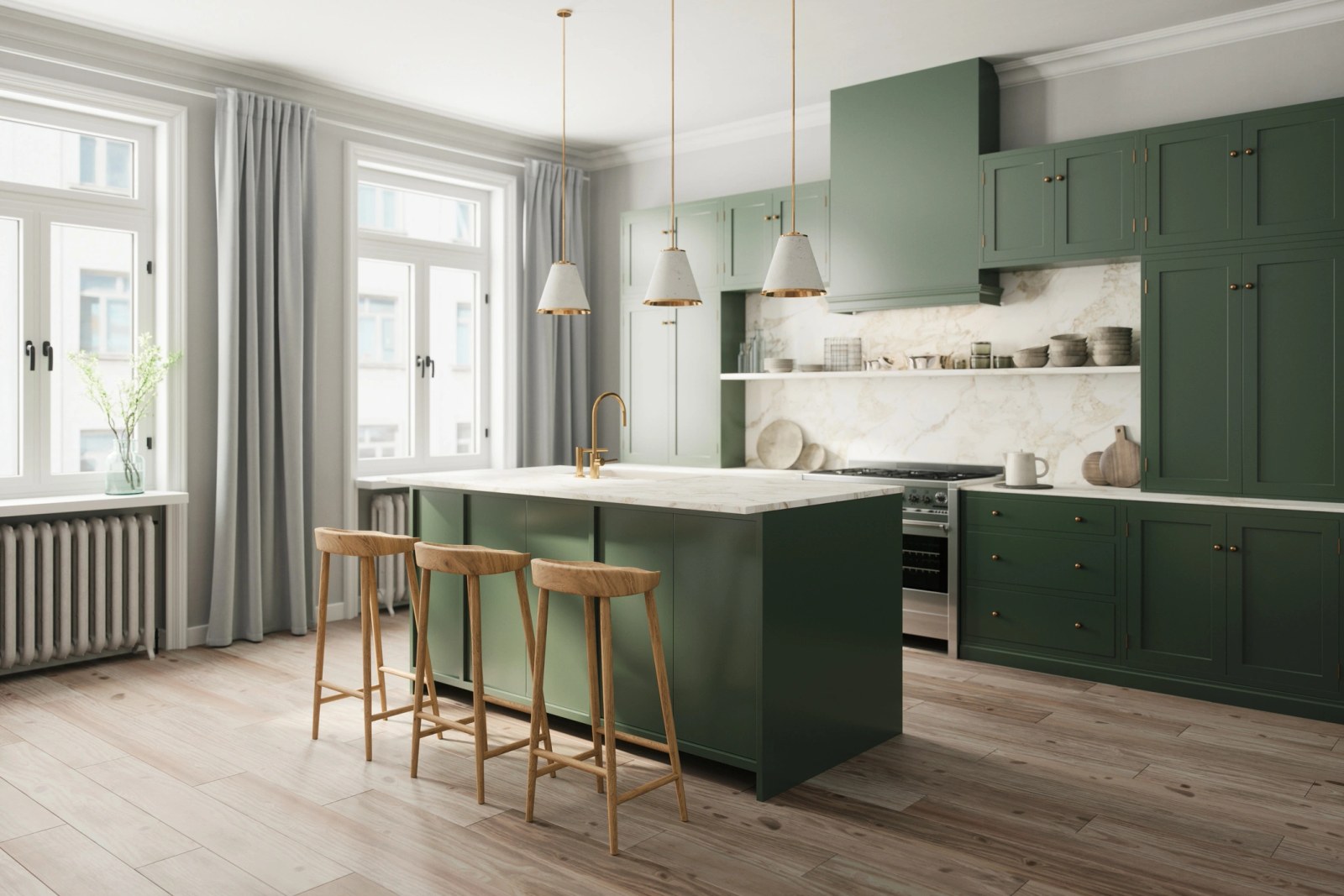 Deep green shaker kitchen with a marble topped island, brass faucet and oak bar stools