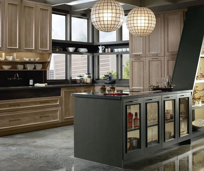 Omega kitchen pairing light oak wall cabinets with a charcoal island and glass-front display doors